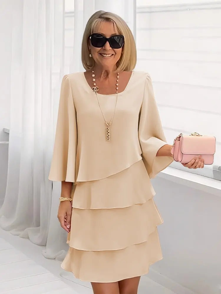Elisa – Elegante vestido vaporoso con volantes