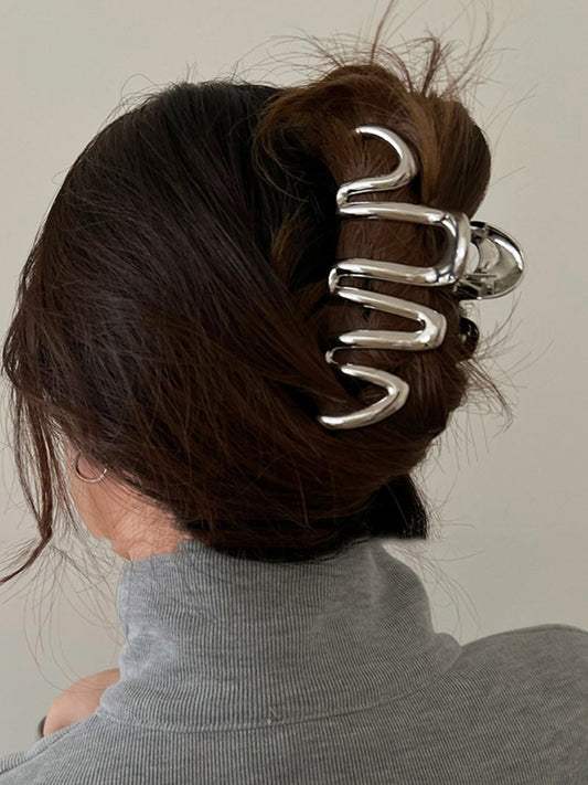 Garra esencial para el cabello