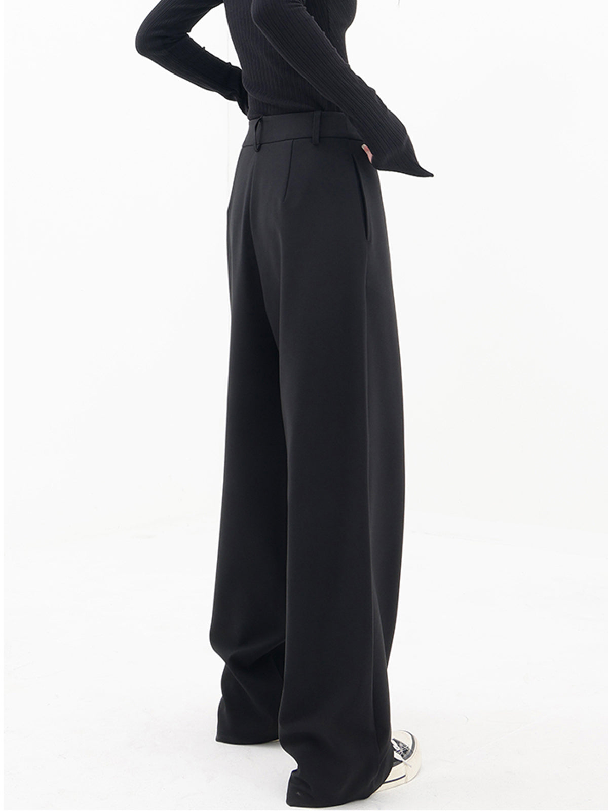 Pantalones de vestir de pierna ancha con botones y capas asimétricas
