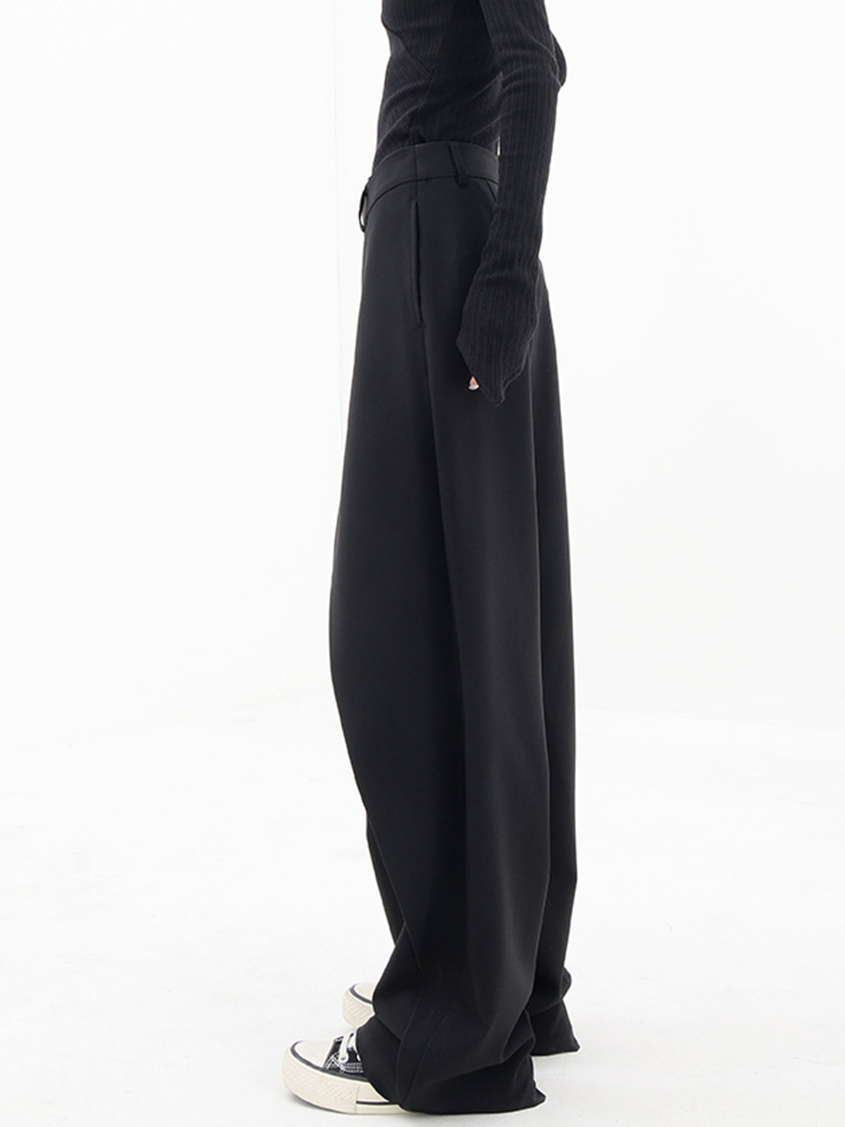 Pantalones de vestir de pierna ancha con botones y capas asimétricas