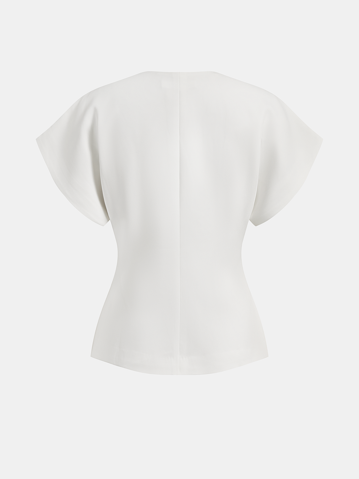 Blusa moderna con cuello en V y botones.