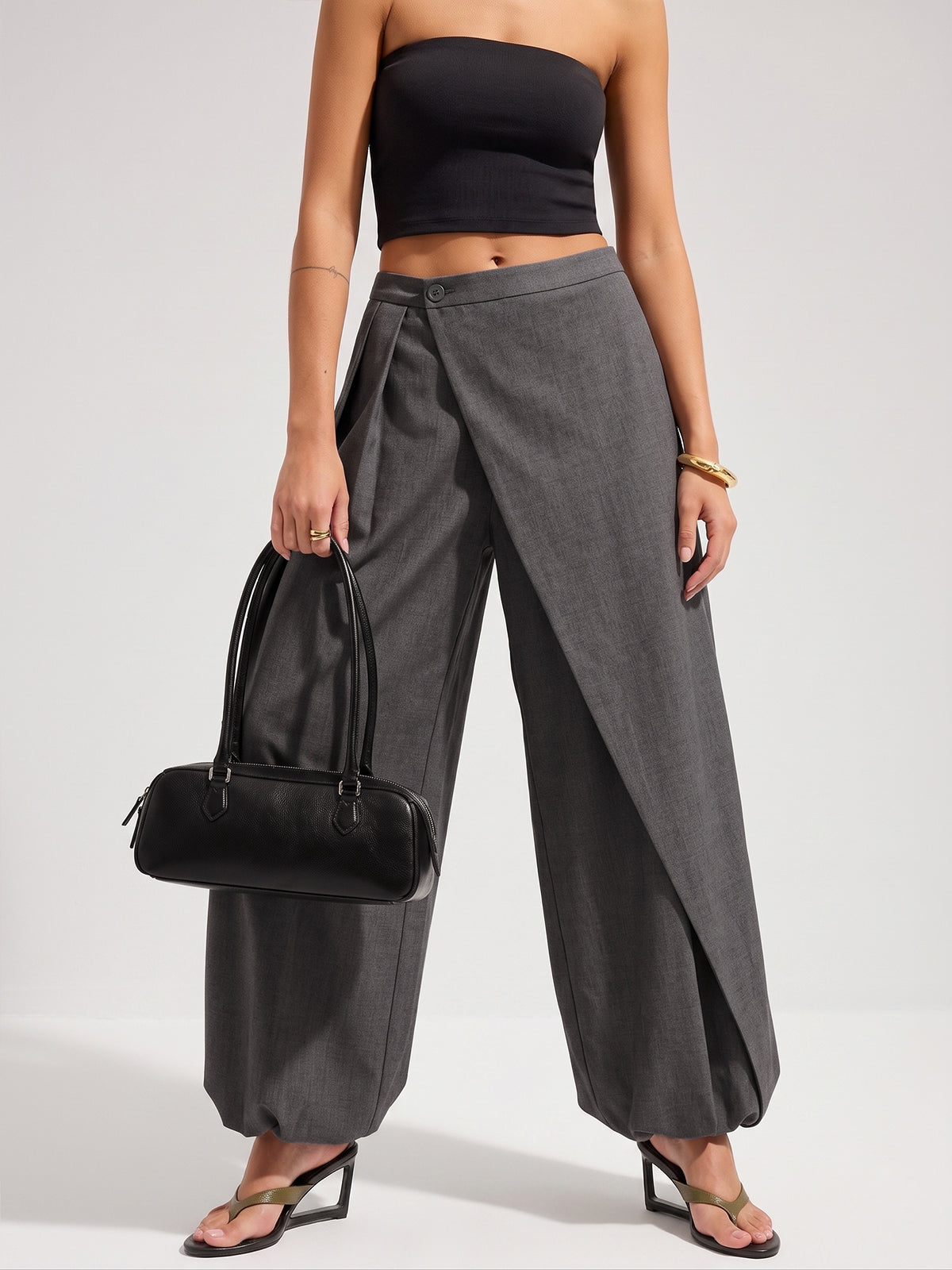 Pantalones anchos tipo globo con superposición asimétrica