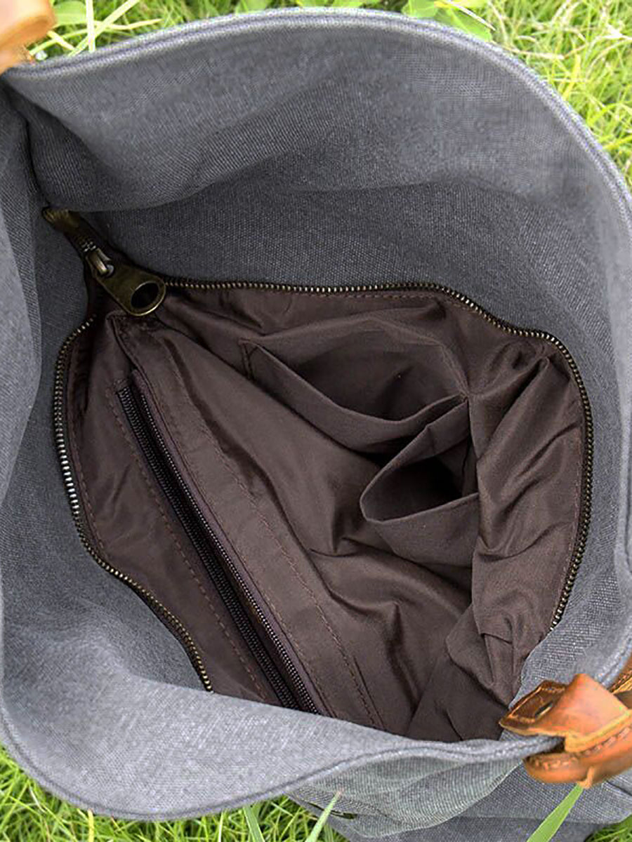 Lienzo femenino y bolso de cuero cruzado