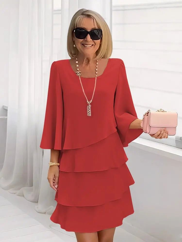 Elisa – Elegante vestido vaporoso con volantes